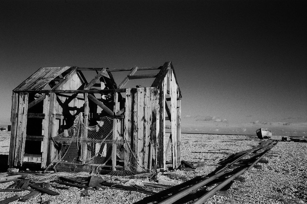 Friday Favourites #lycricallyspeaking. Black and white landscape image which includes an abandoned building.