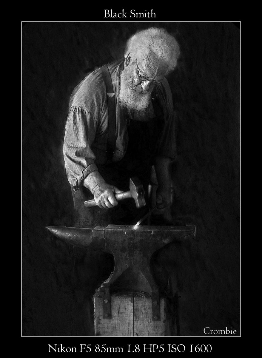 Crombie McNeill. Black and white shot of a black smith working.