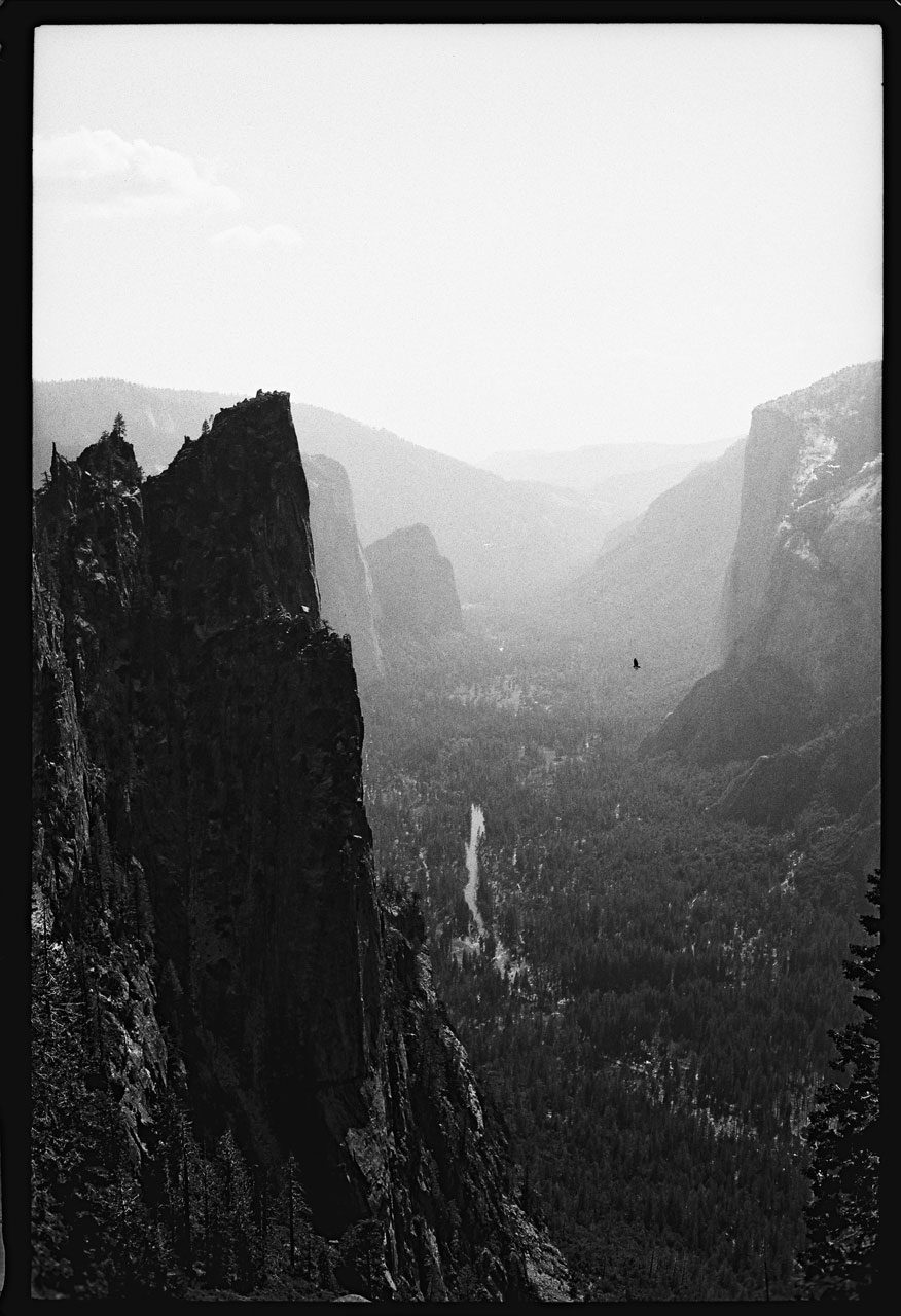 Justin Olsen. Black and white image of a view in the mountains.