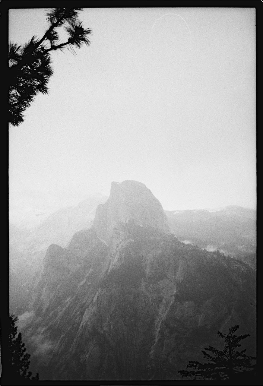 Justin Olsen. Black and white image of a view of a mountain.