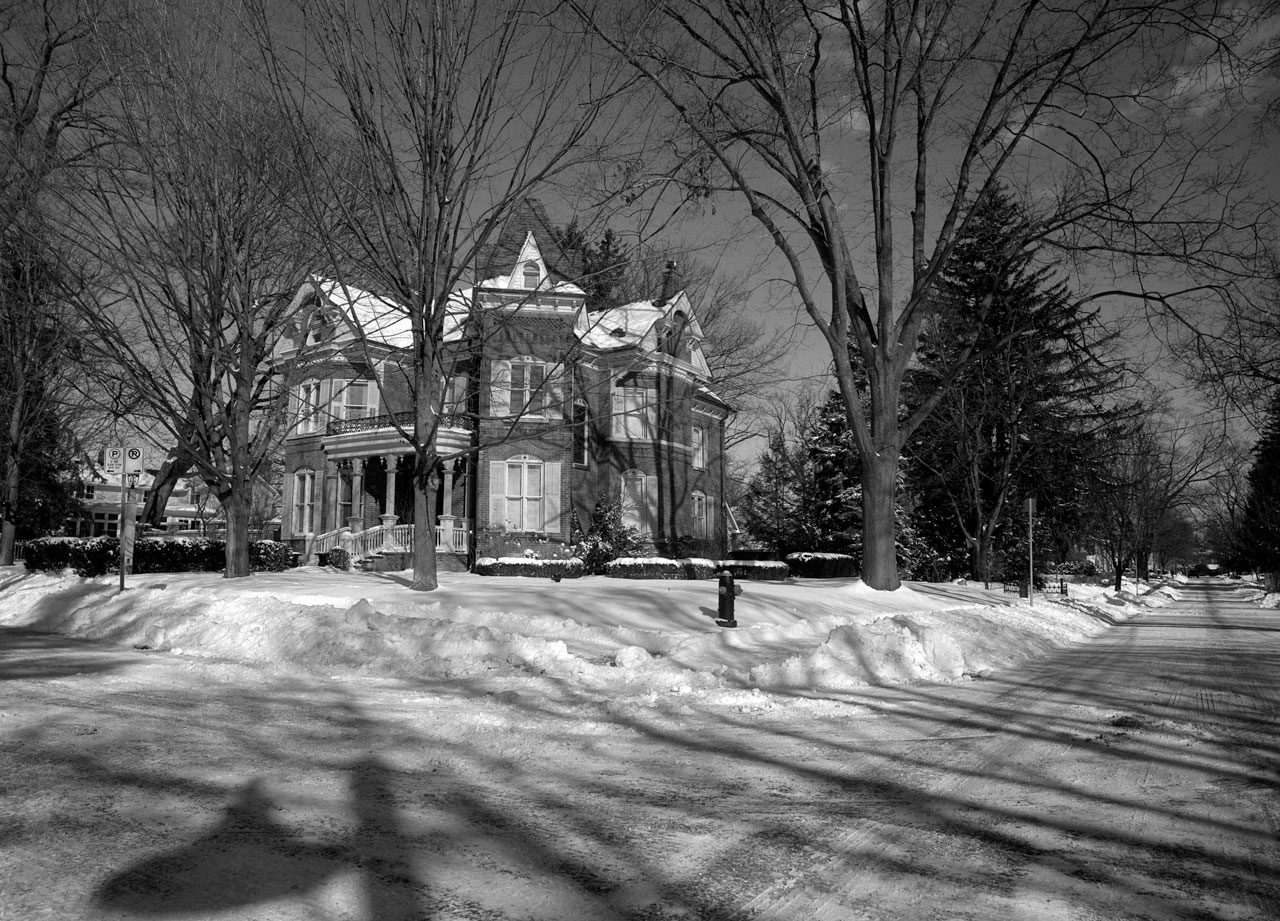 Friday Favourites #highcontrast. Black and white image of a mansion surrounded by snow.