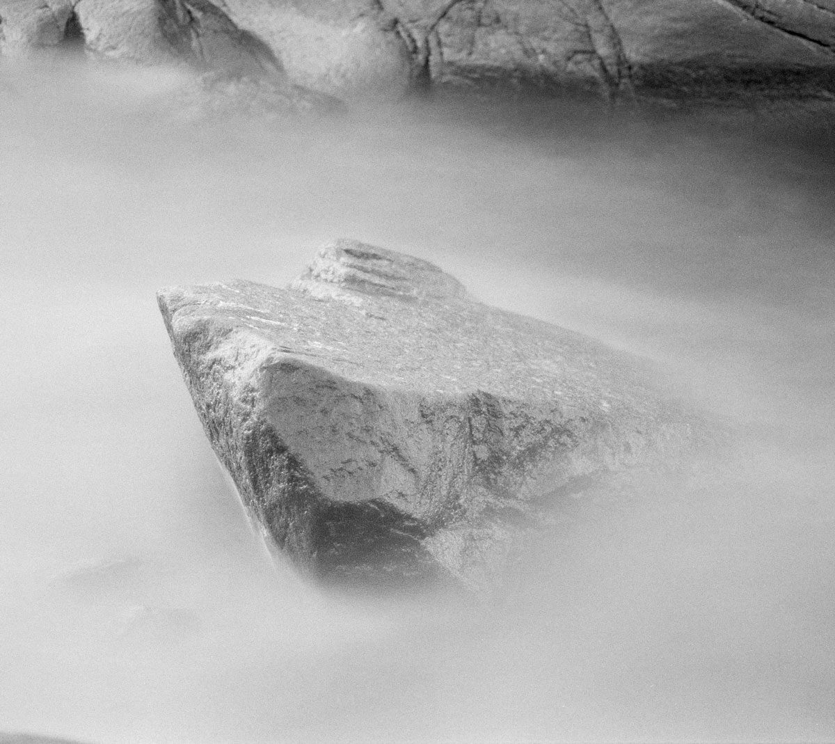 Friday Favourites #themefree. Black and white image of a rock surrounded by mist.