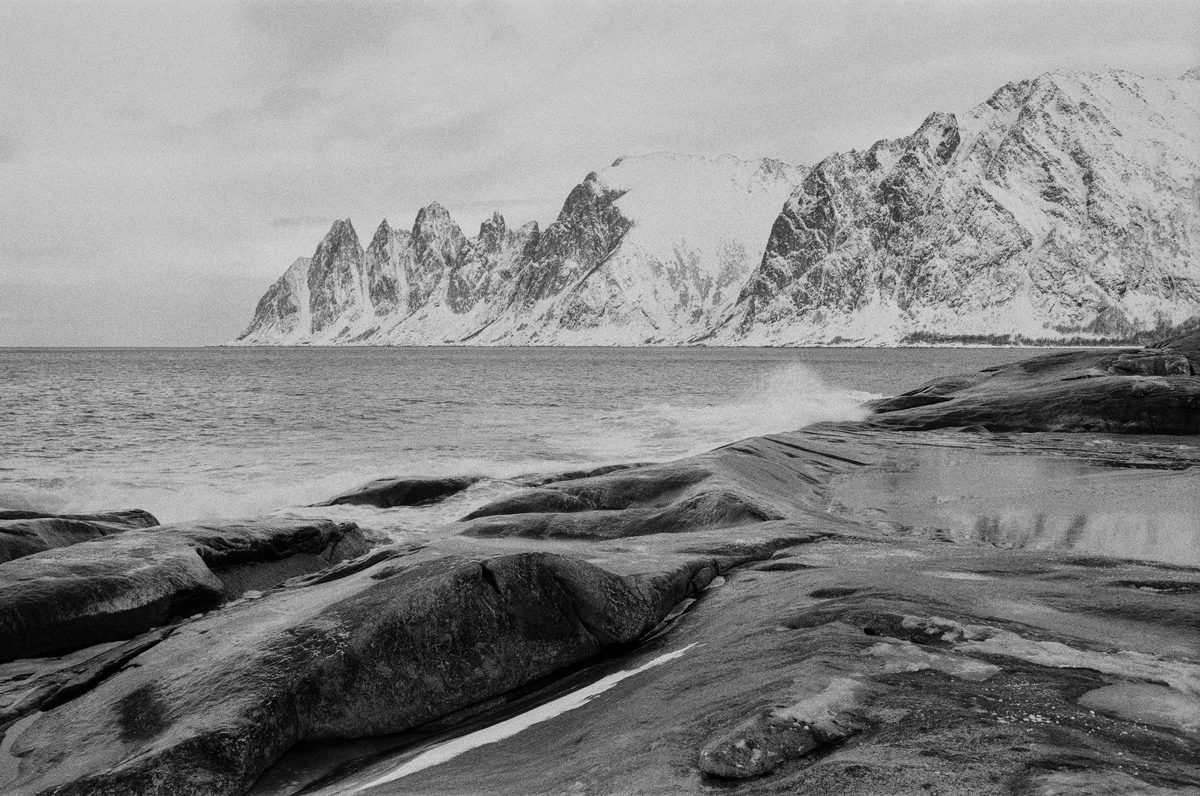 Friday Favourites #bestof2024. Black and white view of the sea and mountains.