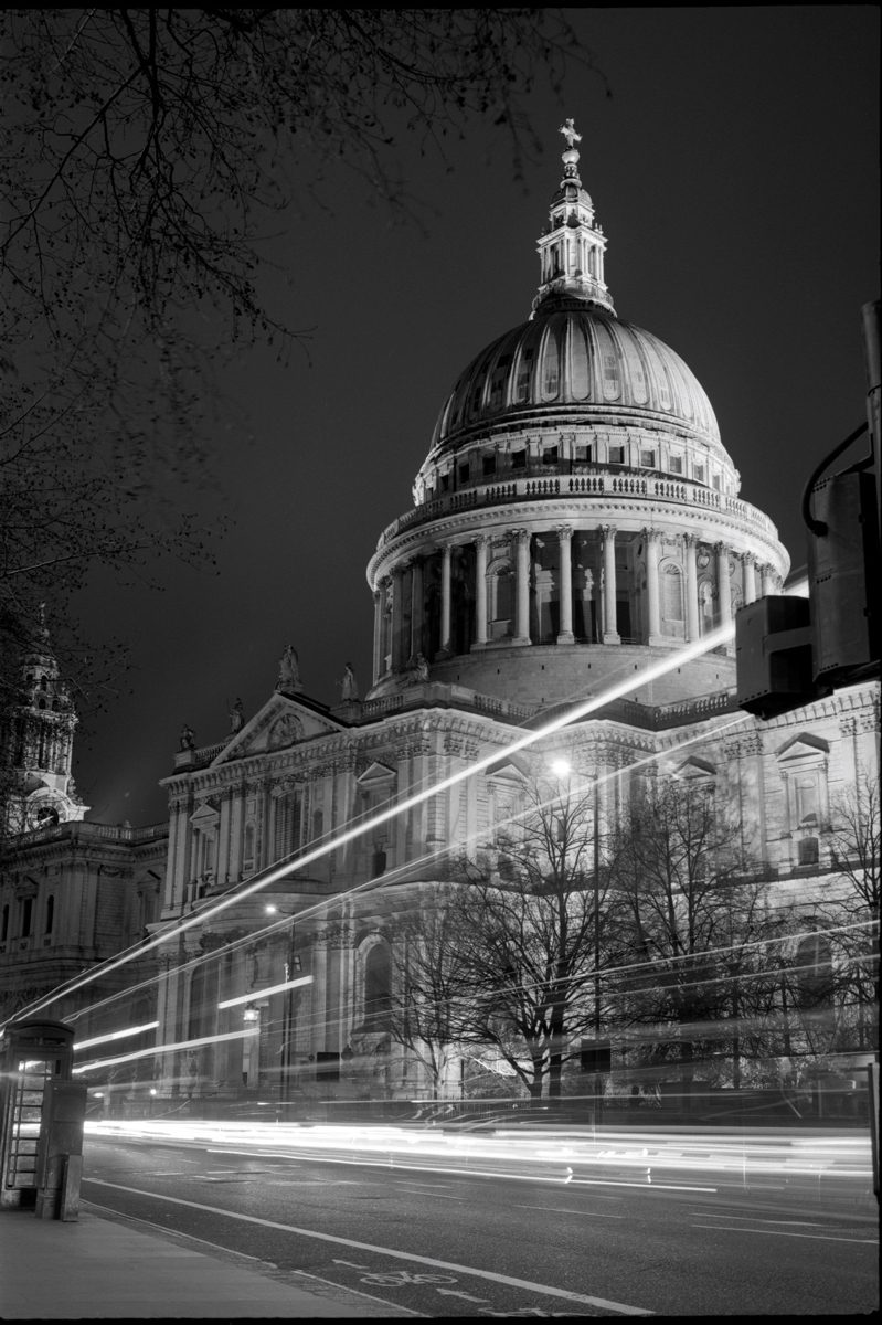 Friday Favourites #themefree. Black and white image of a building with long exposure car going past.