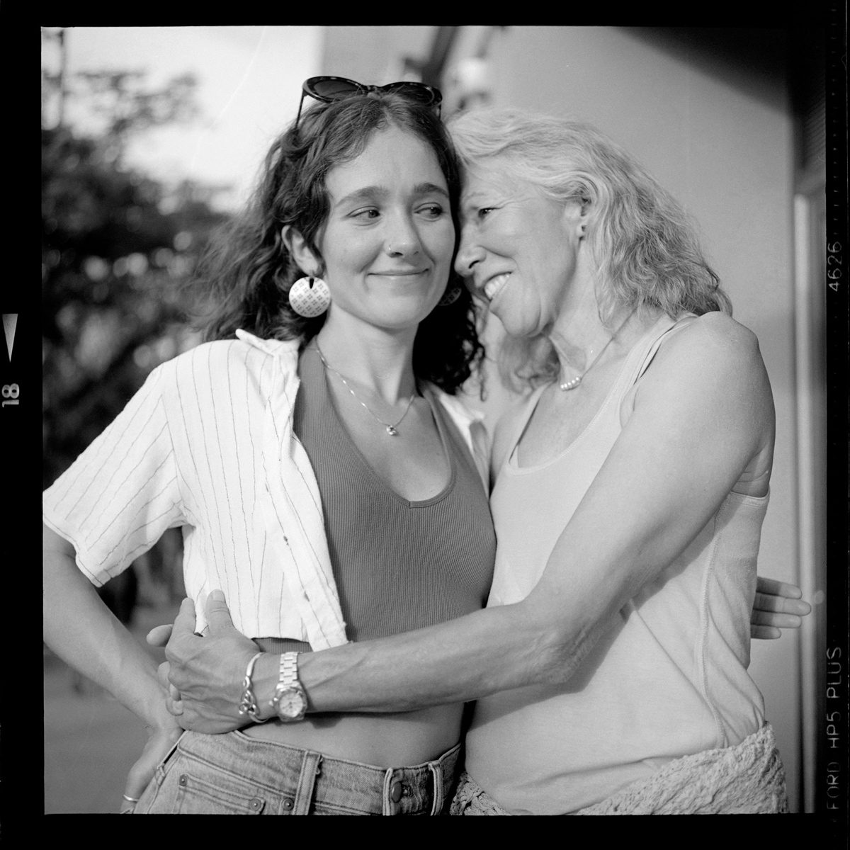 Kenneth Wajda. Black and white portrait of a mother and daughter.