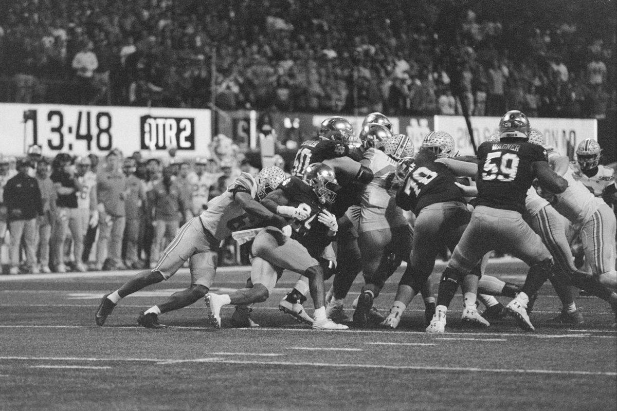 Black and white shot of a rugby match